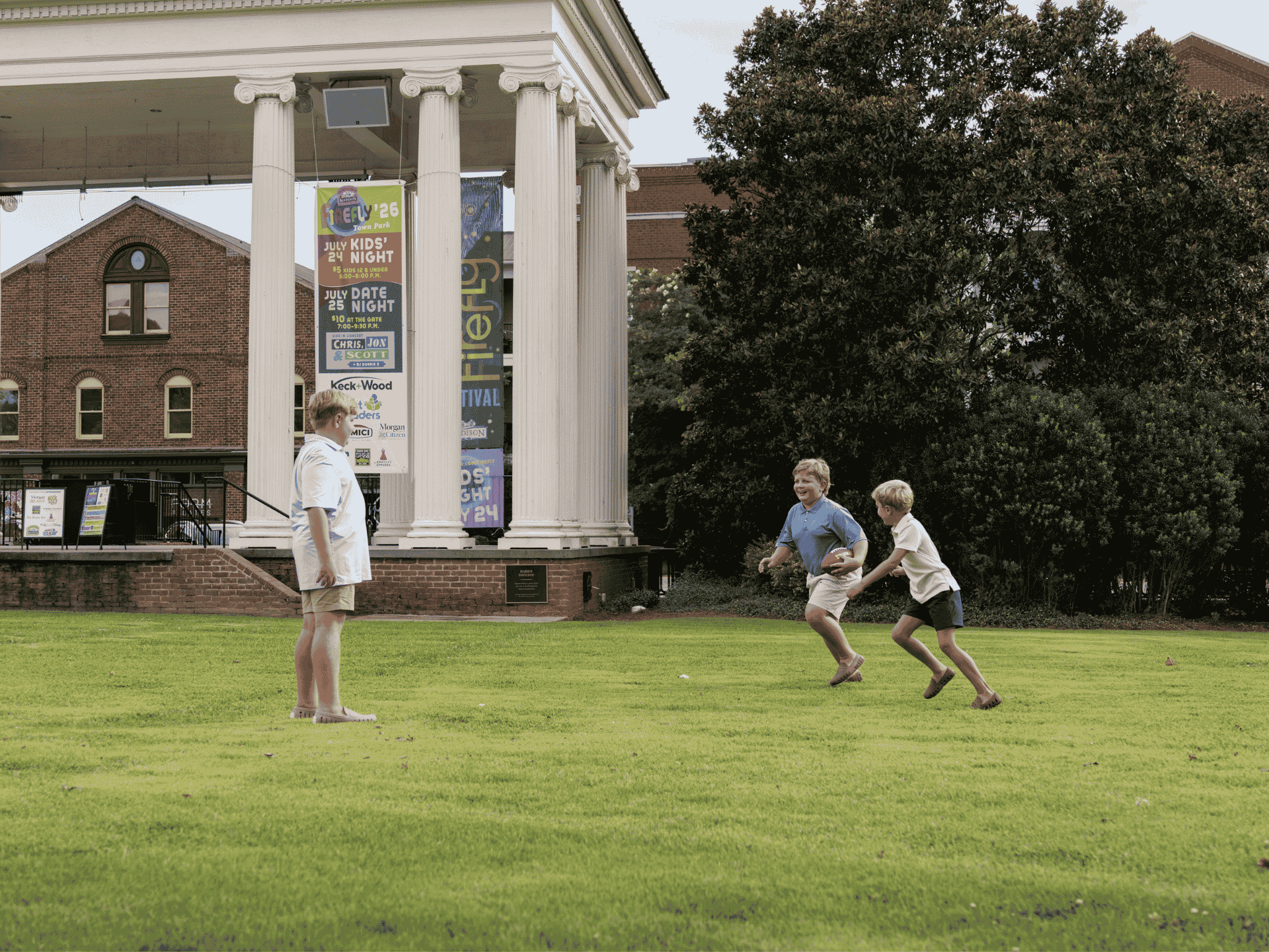 Kids playing football in Madison Town Park