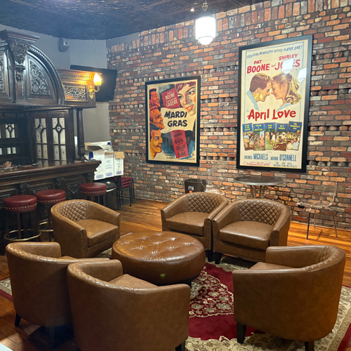 Wing Knights speakeasy event room with leather seating